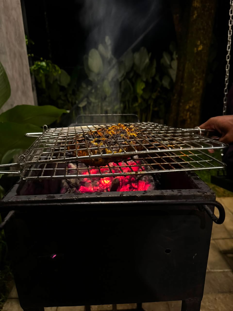 Live charcoal barbecue grill at Windleaf